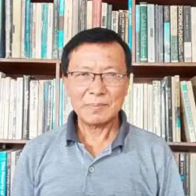 Dr. Krishna B. Bhattachan